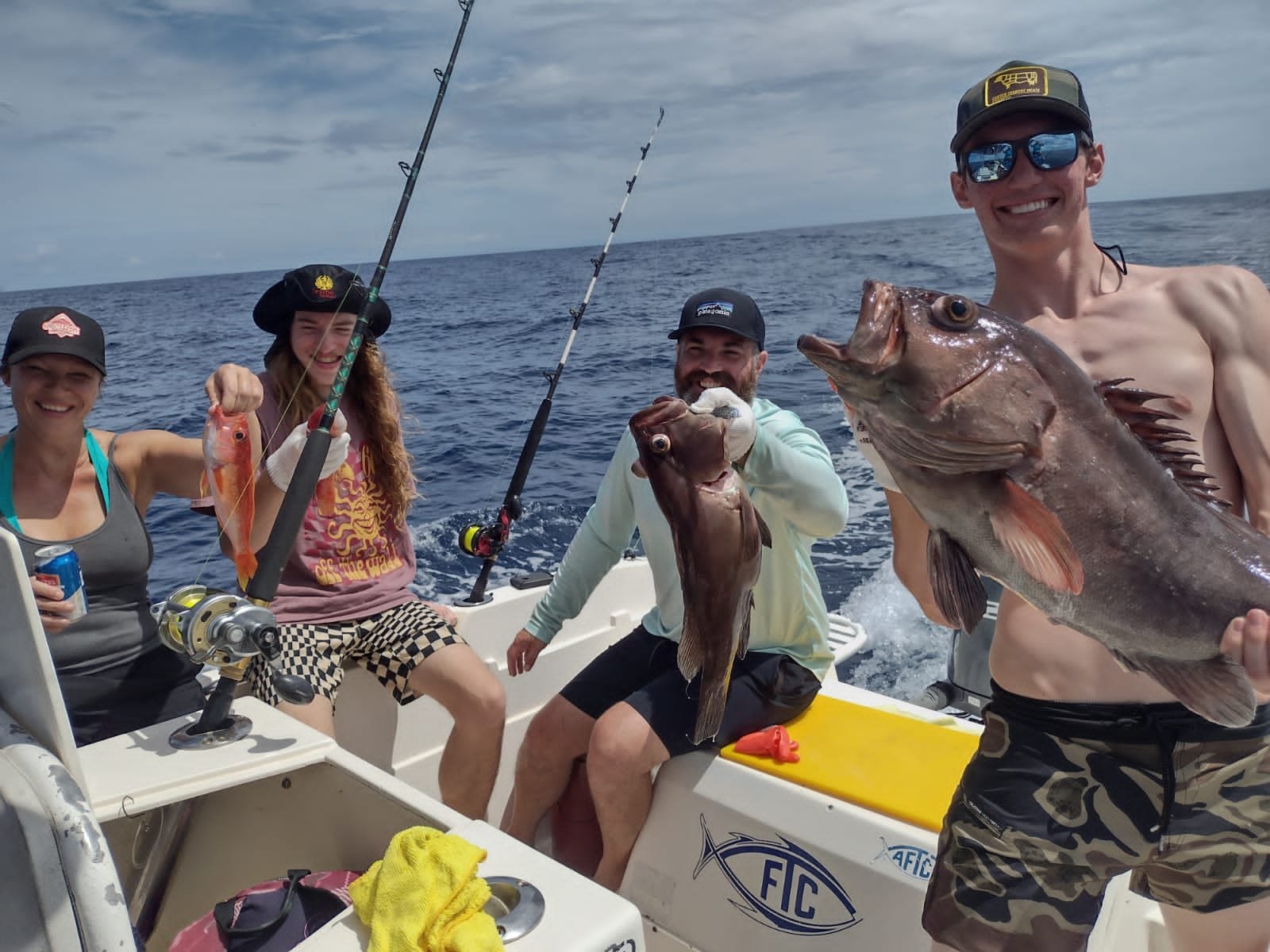 Anglers bottom fishing from a charter boat