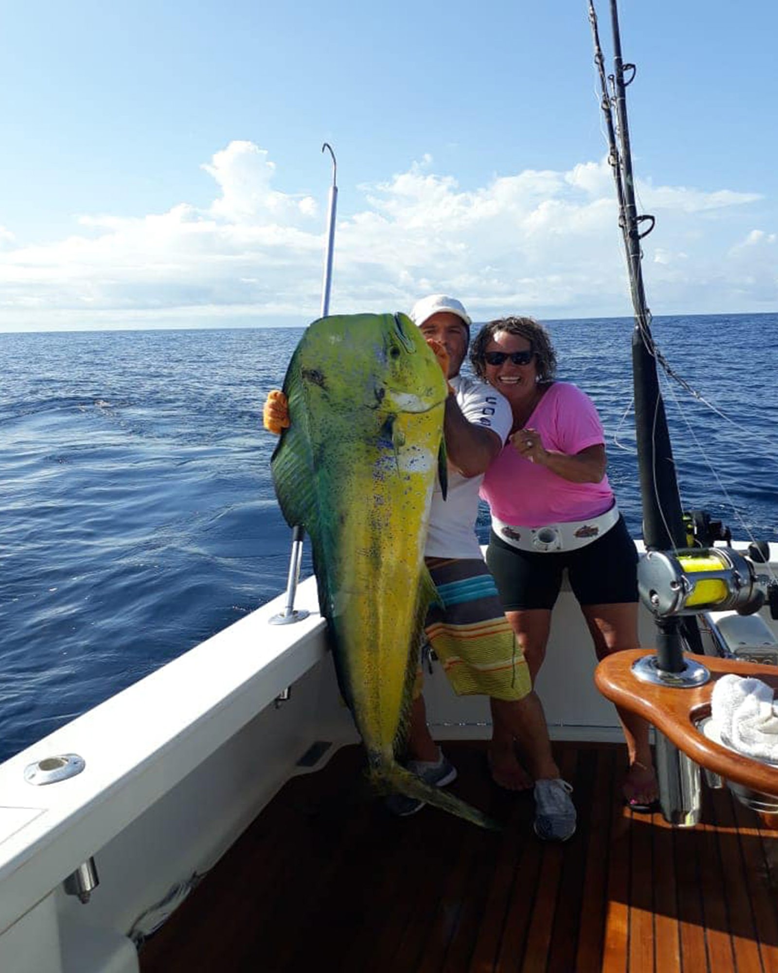 Angler holding a large mahi-mahi