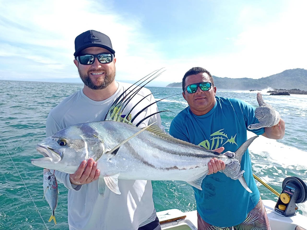 Inshore roosterfish caught near rocky shoreline